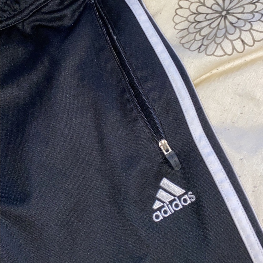 Black and white adidas joggers